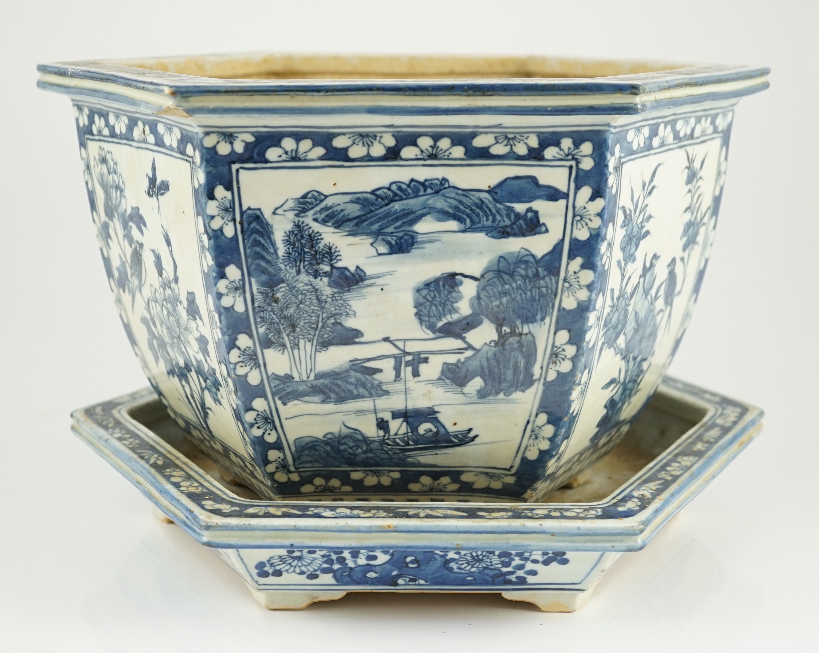 A Chinese hexagonal blue and white planter and underdish, 19th century, 35cm wide, two rim chips